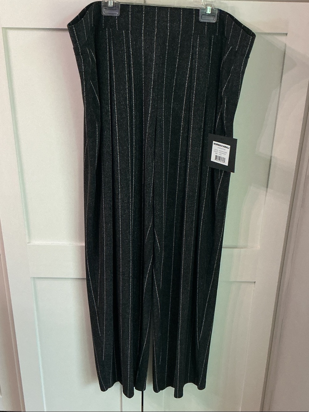 Norma Kamali Low rise pleated trouser with cream colored Pinstripes